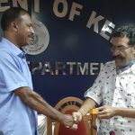 (English) Sri. G. Chandu receiving present from Excise Commissioner